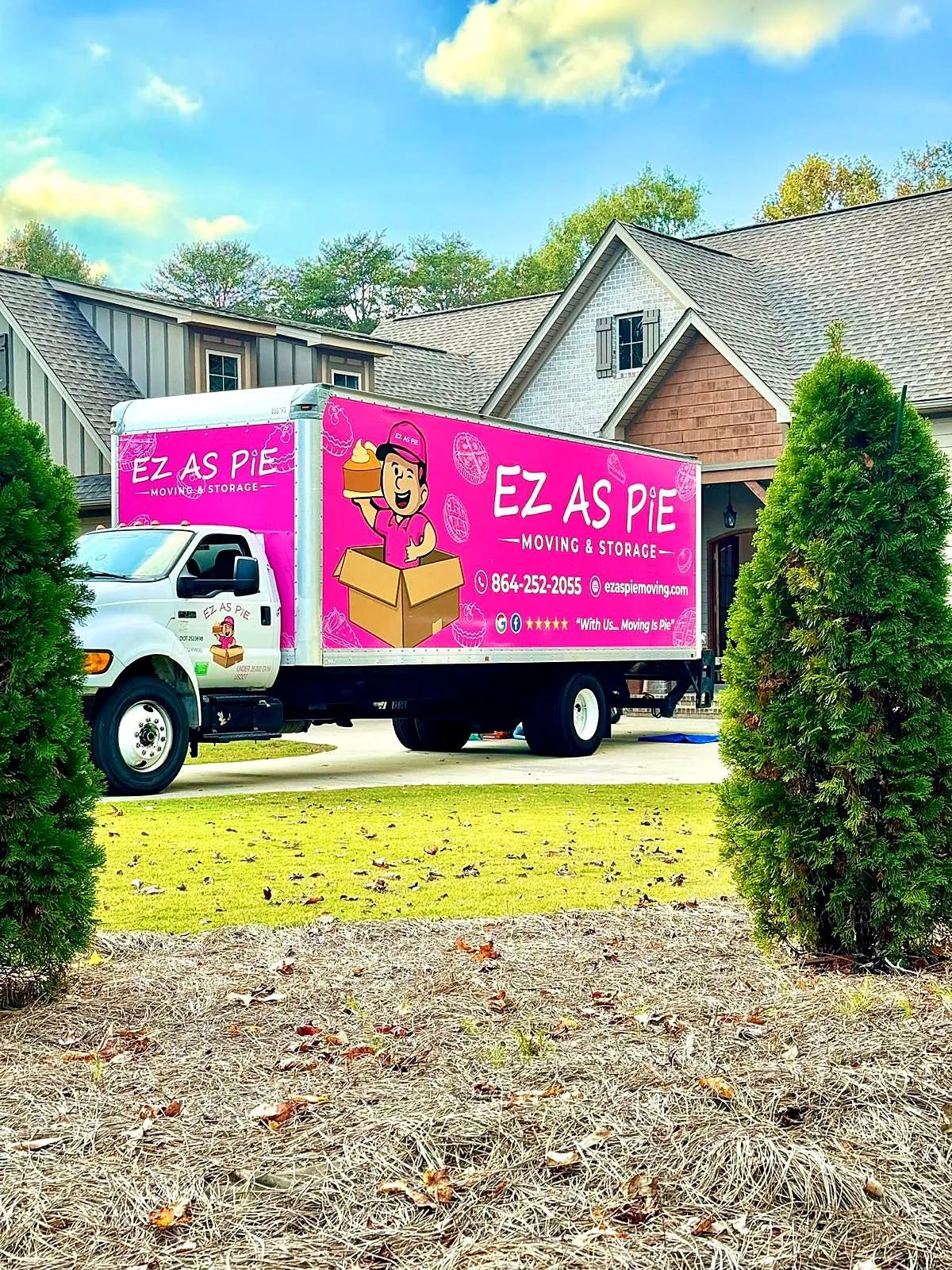 Pink EZ As Pie moving truck at an Upstate home